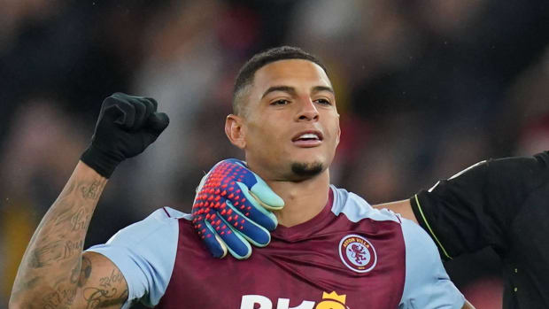 Aston Villa defender Diego Carlos pictured celebrating after a 1-0 win over Arsenal in December 2023